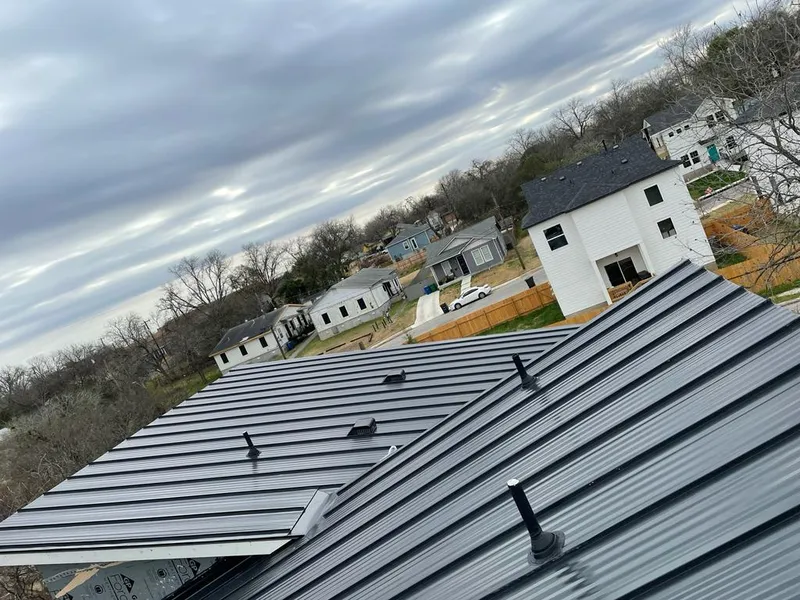 Standing seam metal roof panels with vents for Skylight Repair in South Orange Village
